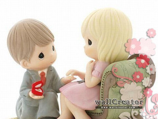 Boy girl figurine sitting chair - a red heart free wallpaper
