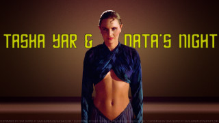 Woman large breast dark background - a neon sign behind her free wallpaper