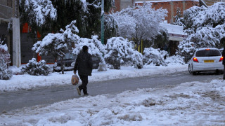 Man walking snow luggage bag - the side of the road free wallpaper