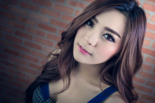 Woman longhair bluedress brickwall portrait - blue dress free wallpaper