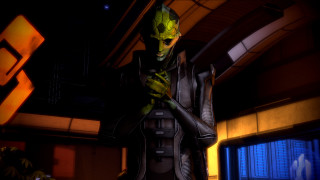 Futuristic man cellphone darkroom neonlight - a futuristic suit holding free wallpaper
