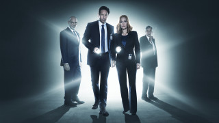 Group people dark room lights - their hand and a man in a suit free wallpaper
