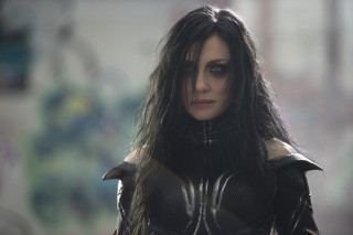 Woman black leather horns outfit - wearing free wallpaper