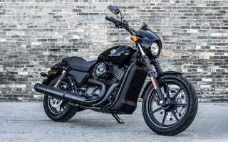 Black motorcycle brick wall headlight - a light free wallpaper