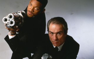 Two men suits holding guns 2 - their face free wallpaper