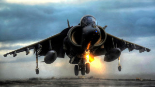 Jet taking off flare smoke - intimidating lighting free wallpaper