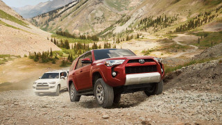 Toyota trucks rocky road mountains - a mountain range in the background free wallpaper