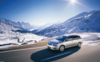 Silver car mountain road snow - a silver car free wallpaper