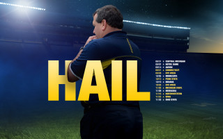 Man standing stadium hail background - a stadium free wallpaper