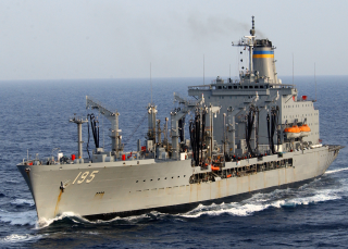 Large gray ship ocean smoke 3 - a tilt shift photo free wallpaper