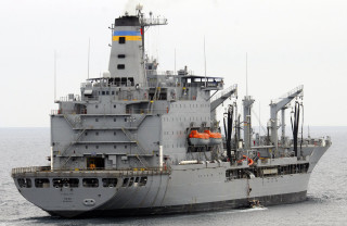 Large gray ship ocean tugboat - nearby free wallpaper