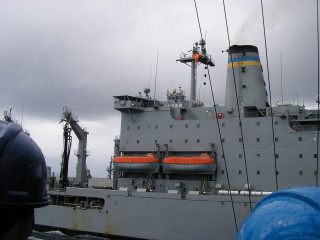 Large gray ship orange seats - a man free wallpaper