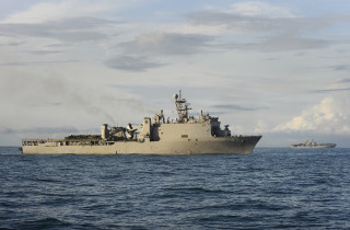 Large ship ocean small boat 4 - cloud free wallpaper