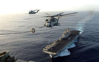 Helicopter flying ship ocean helicopter - action scene free wallpaper