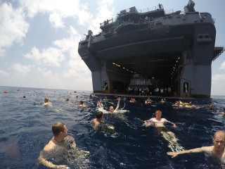 Ocean swimmers large ship crowd - daren bader free wallpaper