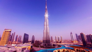 Tall building city river surrounding - over a city free wallpaper