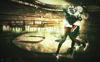 Football player helmet holding football 2 - a football free wallpaper