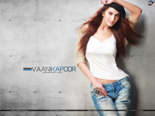 Woman posing hair air hands - jeans free wallpaper