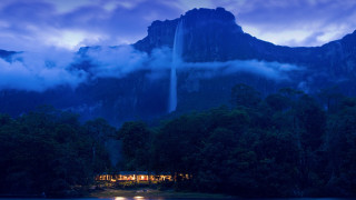 Waterfall night mountains lake boat - scene free wallpaper