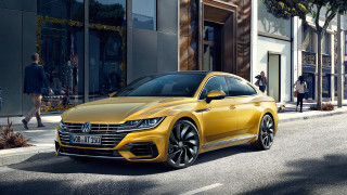 Yellow volkswagen arteus parked street - private press free wallpaper for desktop
