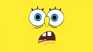 Yellow background frowning face eyes - a face free wallpaper