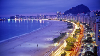 City beach cars mountain night 2 - international typographic style free wallpaper for desktop