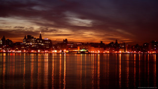 City skyline night reflection water 17 - a reflection of the water free wallpaper