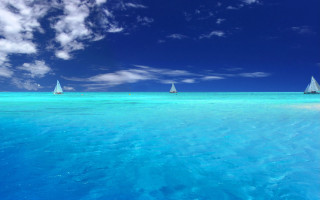 Sailboats ocean beach clouds blue - blue sky free wallpaper