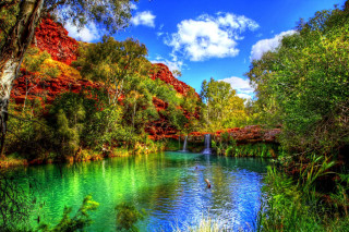 River waterfall person trees autumn - beautiful landscape free wallpaper