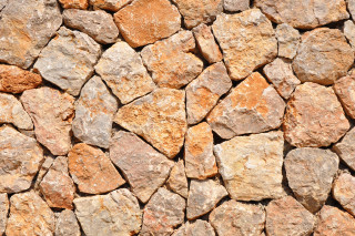 Stone wall rocks brown tan - mosaic free wallpaper