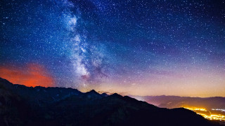 Night sky star filled mountains - a night sky free wallpaper