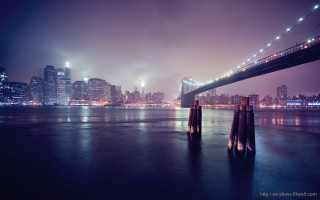 Bridge water city night lights 10 - a bridge over a body of water free wallpaper