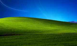 Green field blue sky plane - minimalism free wallpaper