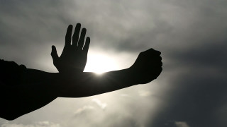 Outstretched hand sun clouds dark - the sun free wallpaper