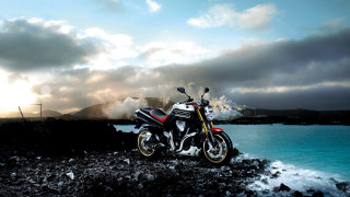Motorcycle rocky shore ocean mountain - the sky free wallpaper