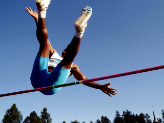 Woman high jump pole shoes - blunt free wallpaper