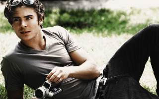 Man sitting grass camera other - perfect free wallpaper for desktop
