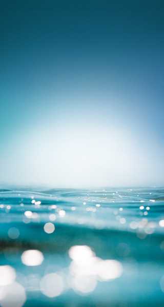 Blurry ocean blue sky water - a surfboard free wallpaper