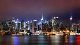 City skyline tall buildings nighttime 7 - the building and the water free wallpaper