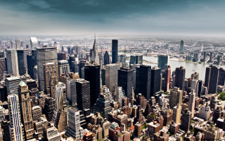 City tall buildings river dark - a dark cloud in the sky free wallpaper