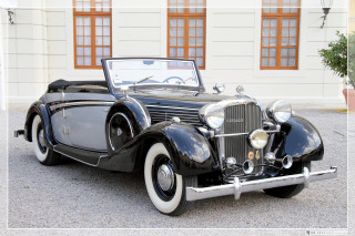 Black car parked building white - dieselpunk free wallpaper