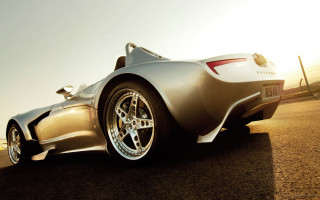 Silver sports car parked side - f 8 aperture free wallpaper