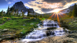 Waterfall mountain sunbeam sky nature - a green field below free wallpaper