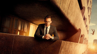 Man suit tie leaning wall 2 - a wall free wallpaper