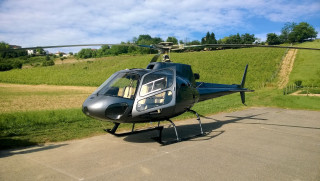 Helicopter parked runway field grass - a helicopter free wallpaper