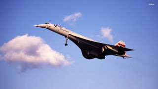 Jet flying blue sky clouds 5 - barron storey free wallpaper