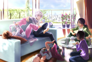 Group couch livingroom coffee table - a group of people sitting free wallpaper