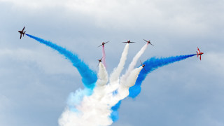 Four airplanes flying formation blue - angular free wallpaper
