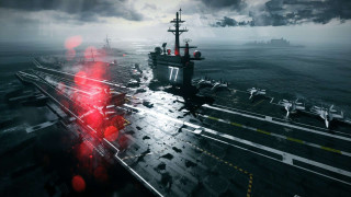 Large ship ocean red light - a dark sky in the background free wallpaper