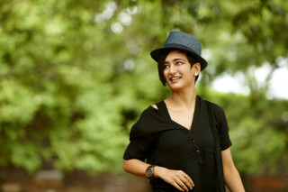 Woman black shirt hat smiling - a park free wallpaper